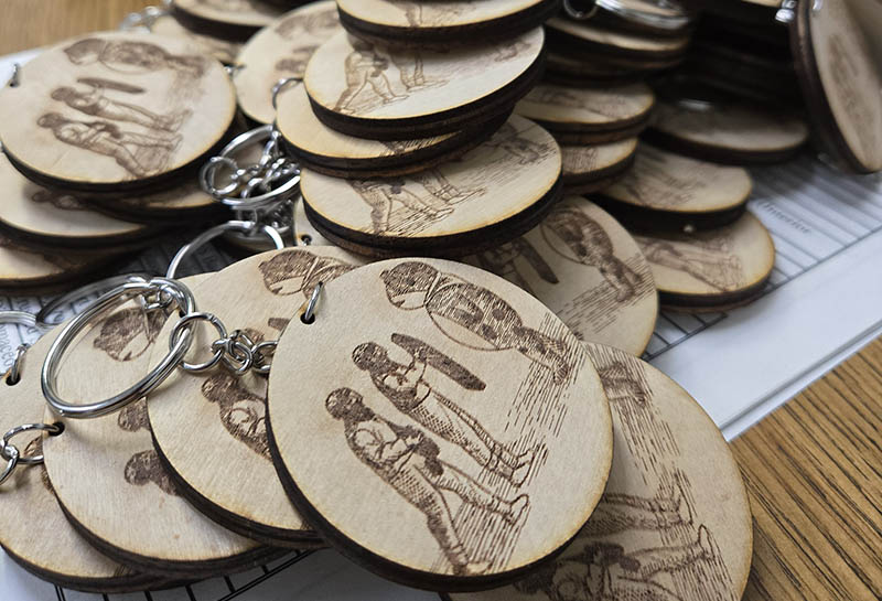 Frog keychains being assembled