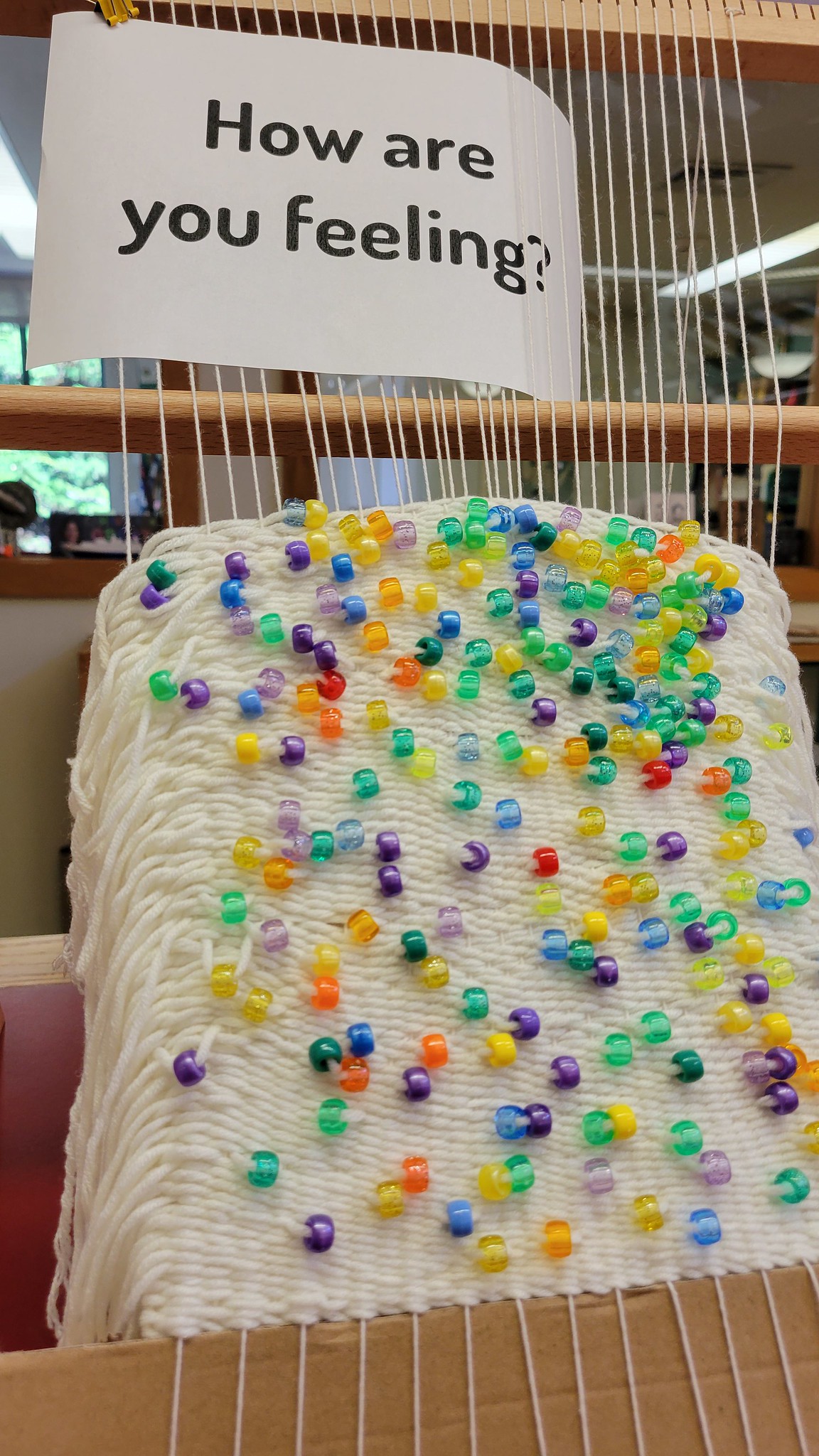 Hopkins guestbook loom with white yarn