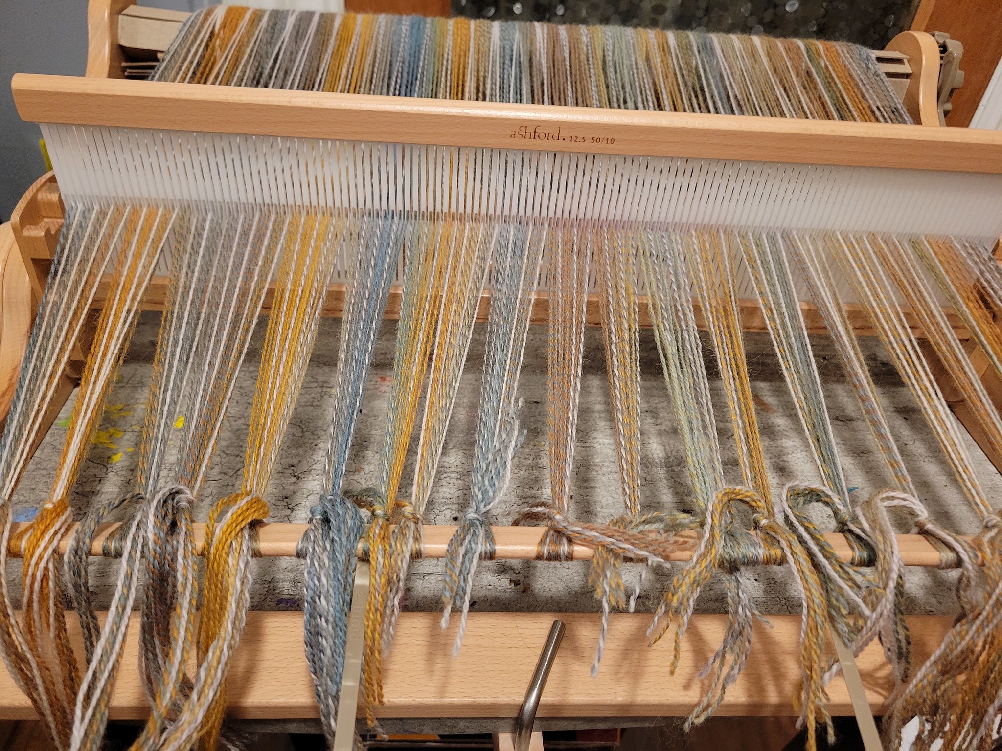 Winding on the warp of the first shawl